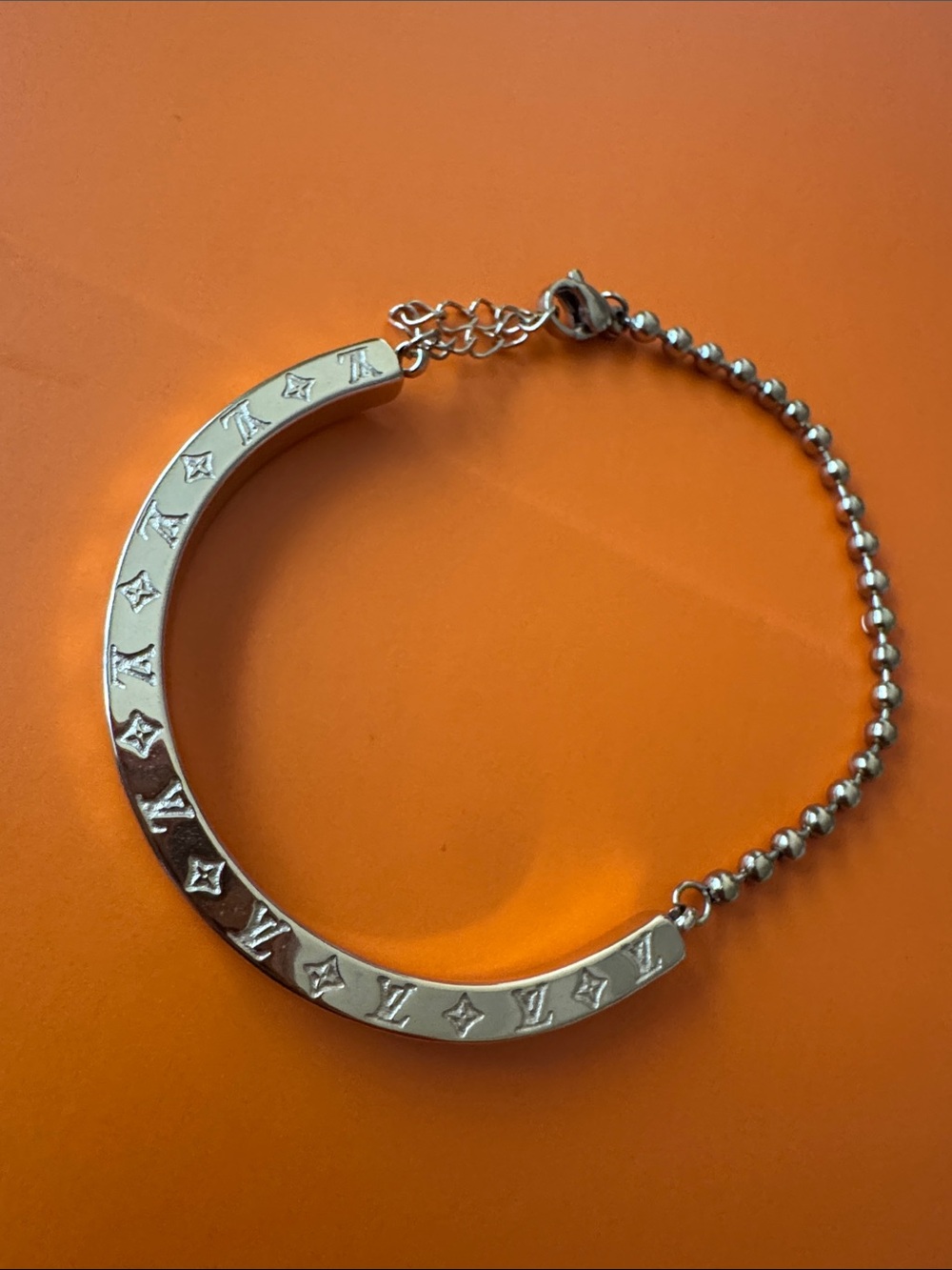 Gold Tone Designer Monogram Crescent Bracelet